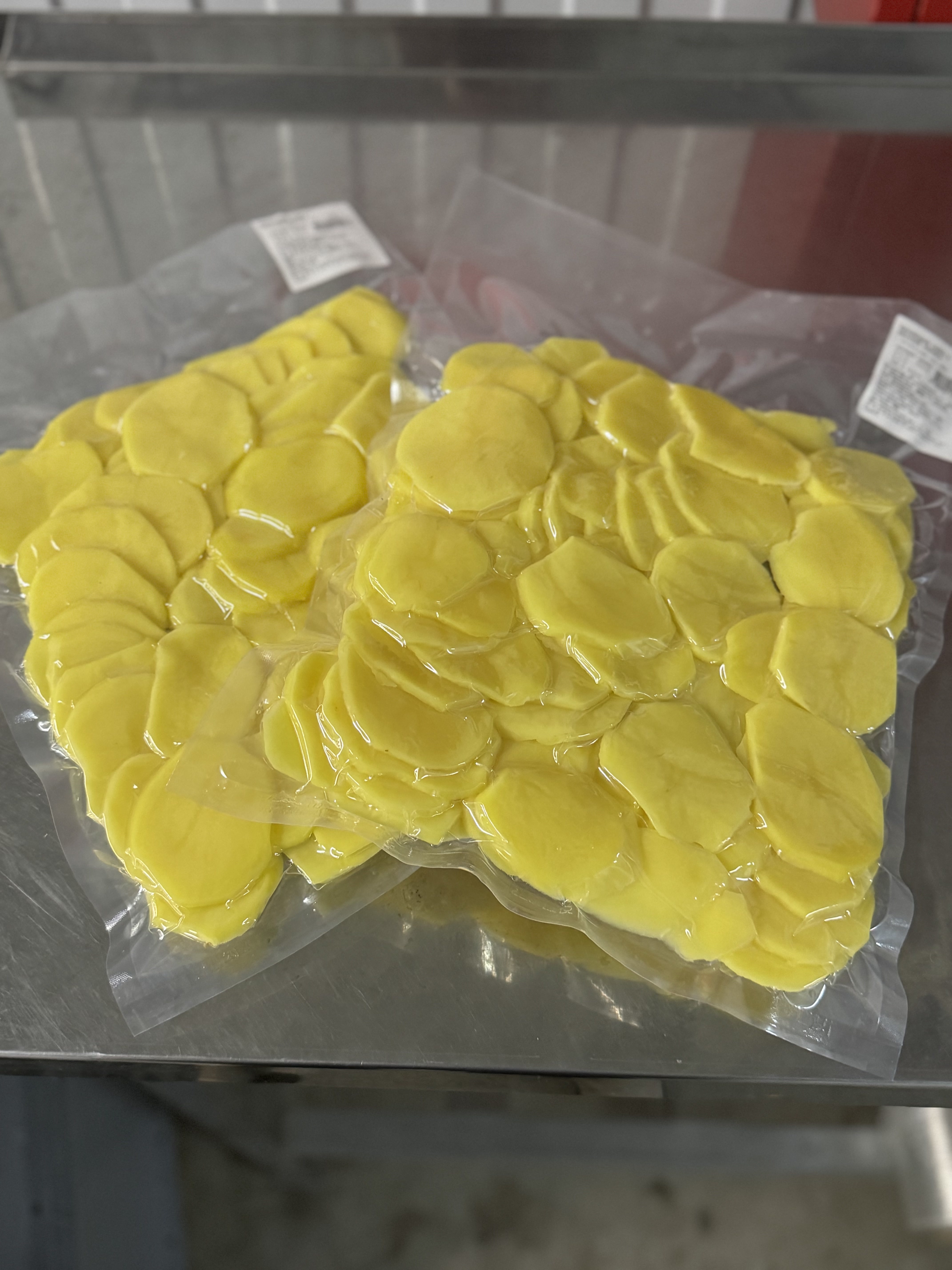 Фото «Родные поля»: kartofel kruglye lomtiki vakuum dva paketa